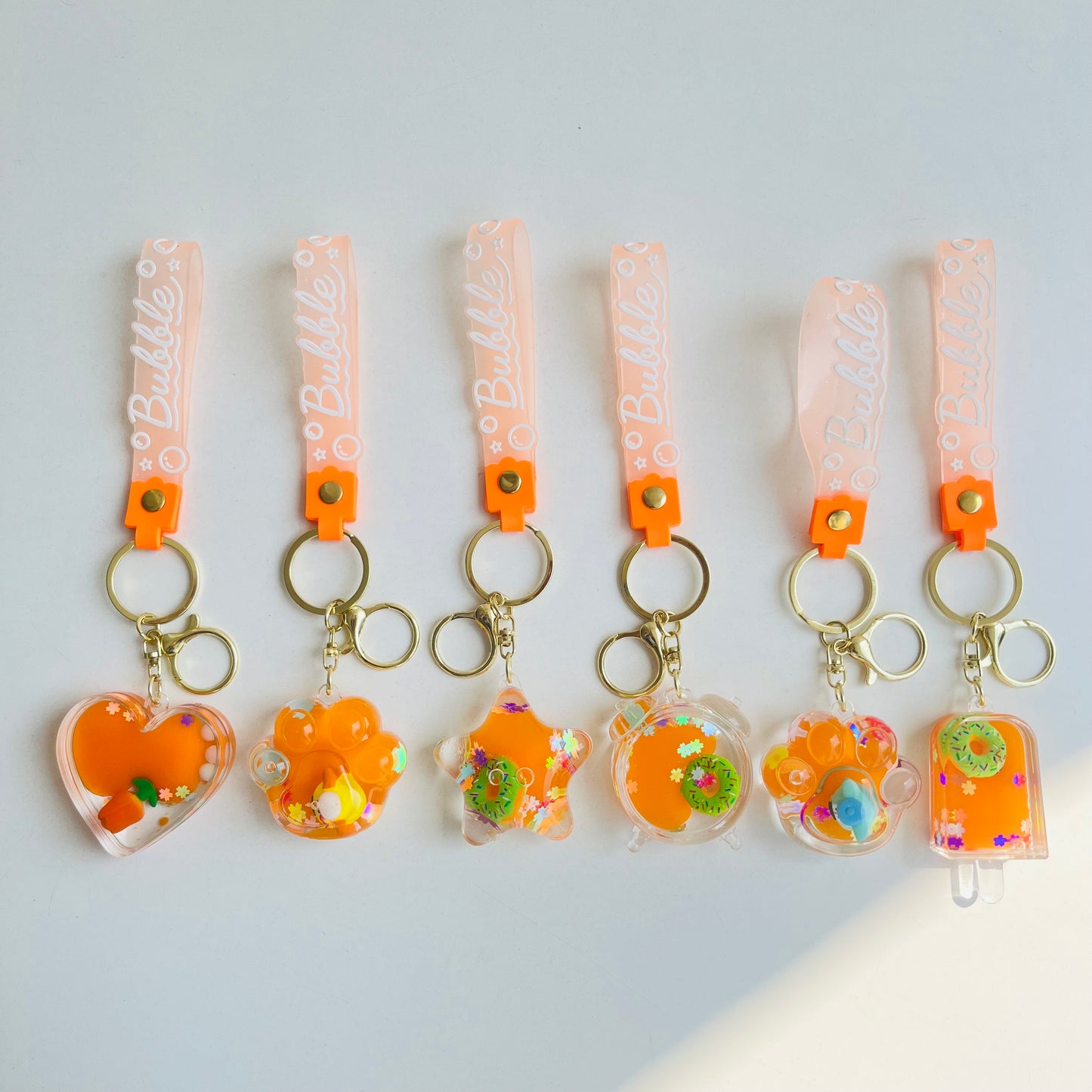 Orange Floating Water Keychain |Buy 1 & Get 1 FREE