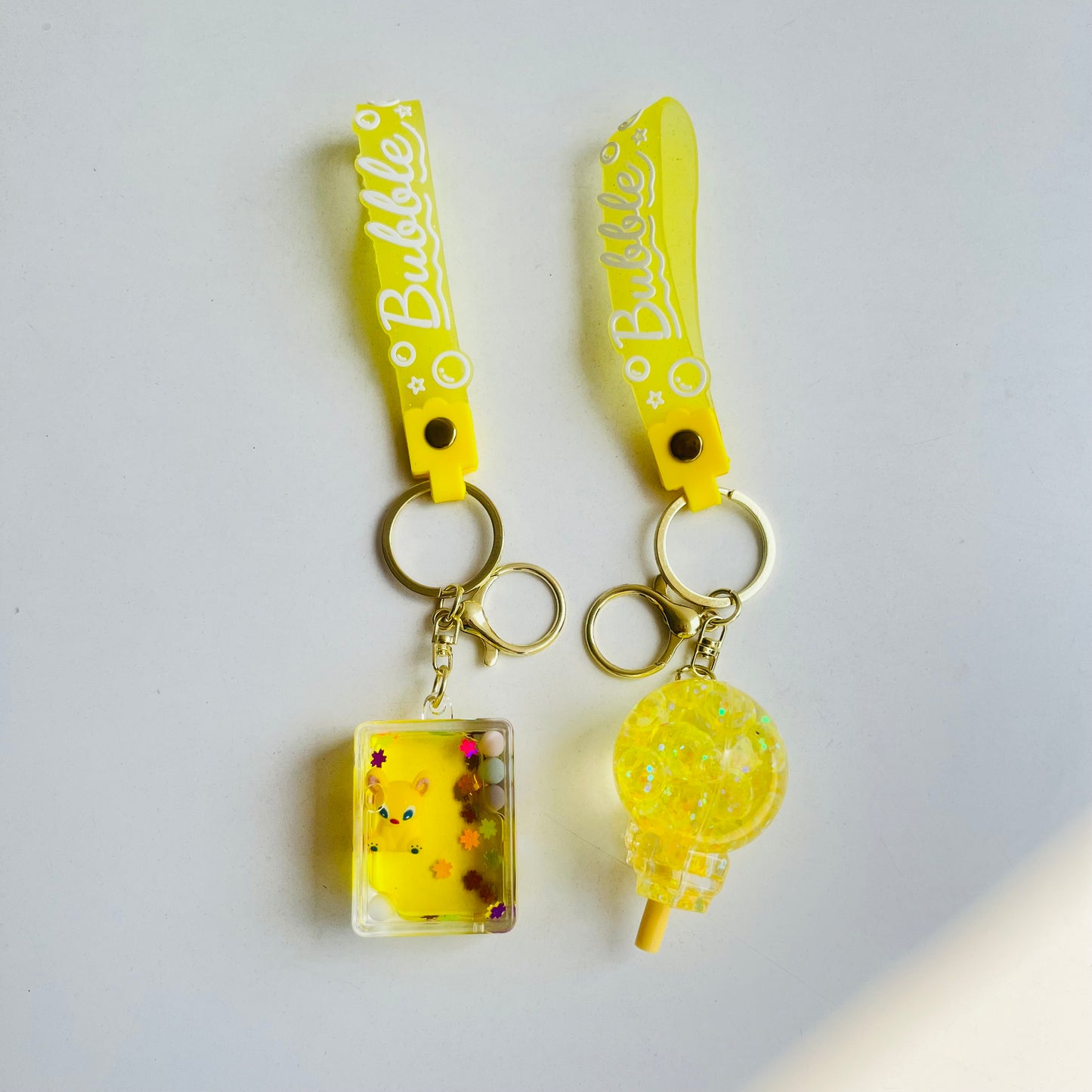 Yellow Floating Water Keychain |Buy 1 & Get 1 FREE