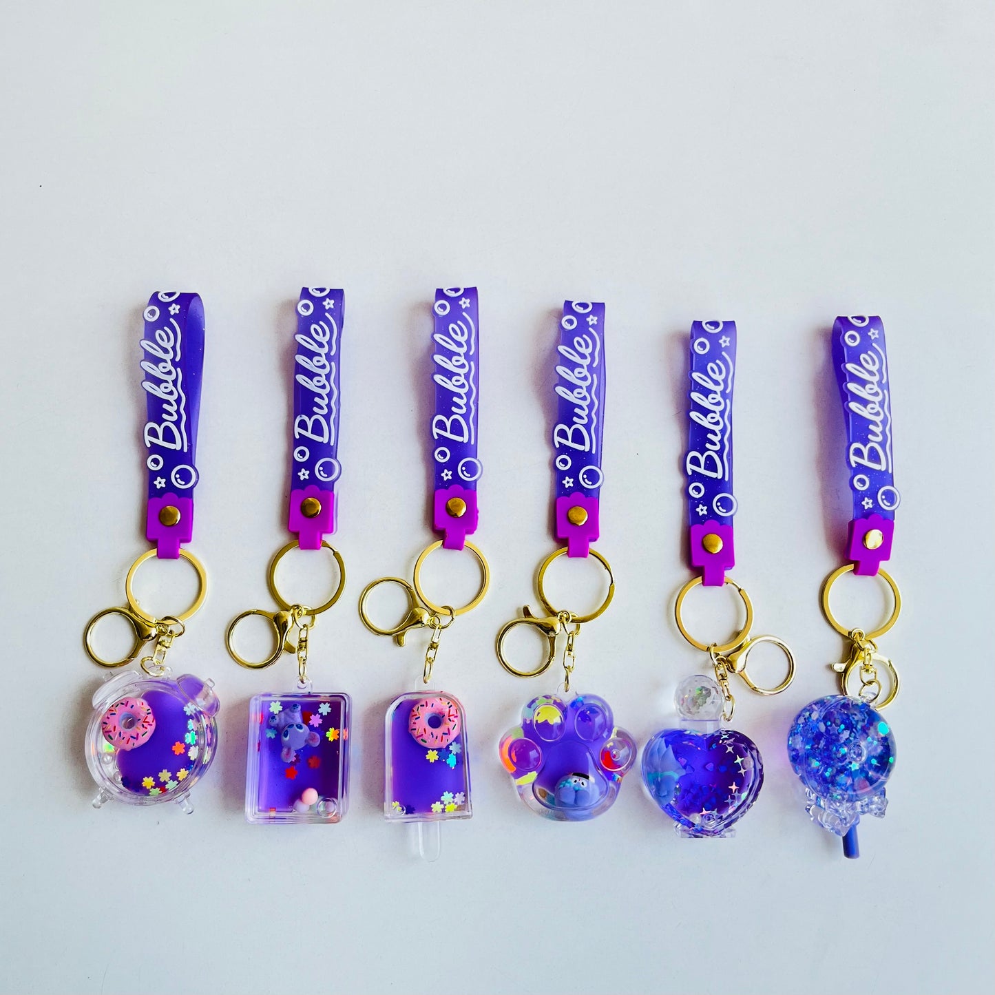 Purple Floating Water Keychain | Buy 1 & Get 1 FREE